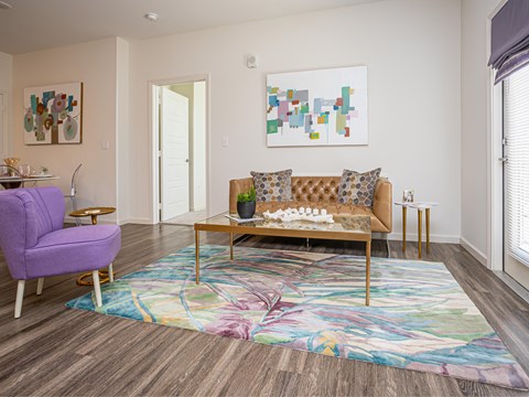 a living room with a couch and a coffee table